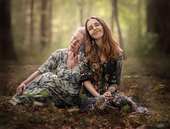 Elderly-woman-and-young-woman-in-forest elderly-woman-and-young-woman-in-forest family photo session
